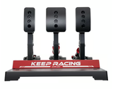 SIMAGIC P1000 3 Pedal Set Floor Mount for virtual racing, featuring precision and realism, with "Keep Racing" branding on a red base