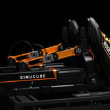 Simucube Active Pedal Add-On Set for sim racing, featuring high-end, adjustable force feedback pedals in black and orange.